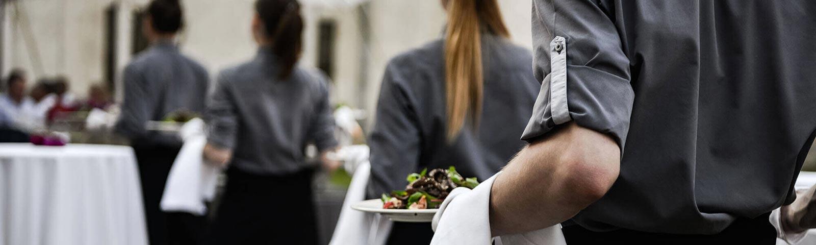 Waiting staff bring out the starters