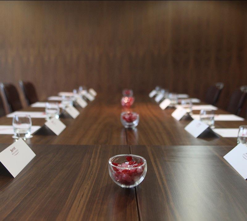 Close up of a table in boardroom.