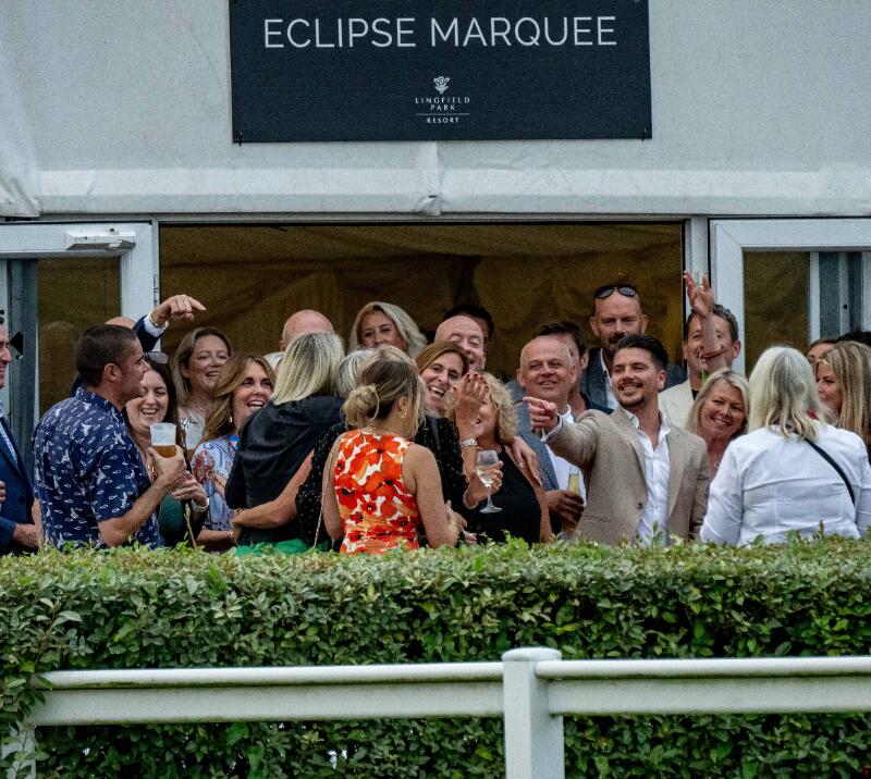 A large group of race goers enjoying hospitality at Lingfield Park