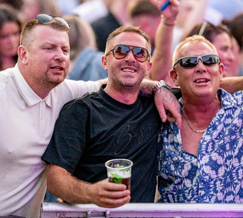 Stag do singing along to tribute band